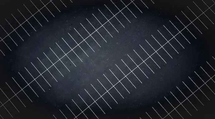 A drone view at night of parking lot lines